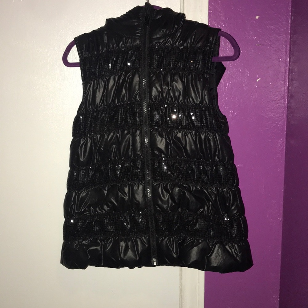 Sleeveless jacket (I think)